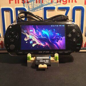 Sony PSP 1001 with Charger, Memory Stick, & Games